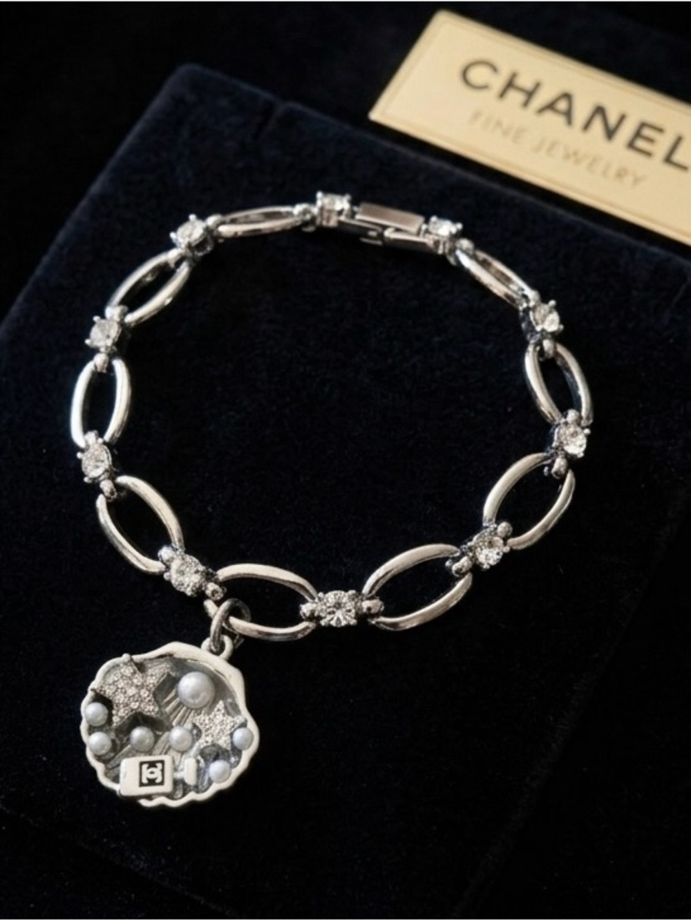 ChaneI Silver-Tone Link Bracelet with Clam Shell Charm  with Embellishments